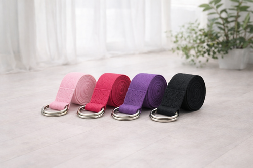 Set of colorful adjustable yoga straps with metal D-rings for stretching and flexibility training
